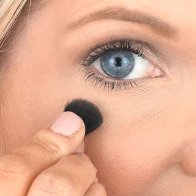 Squeeze brush flat between fingertips