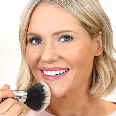 Apply a fine dusting over the face, or just your T-Zone