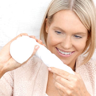 Once cleansed, re-soak cloth in warm water & squeeze out