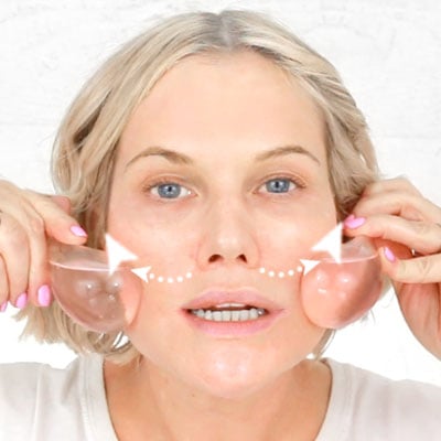 Sweep under cheekbones towards your ear