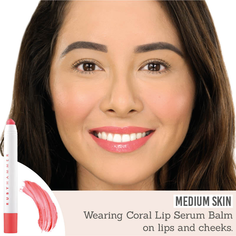 Ruby Hammer Coral Lip Serum Balm on medium skin