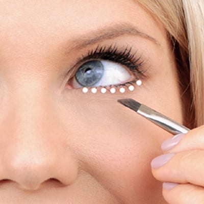 Apply Contour under lower lashline for a smokey eye effect